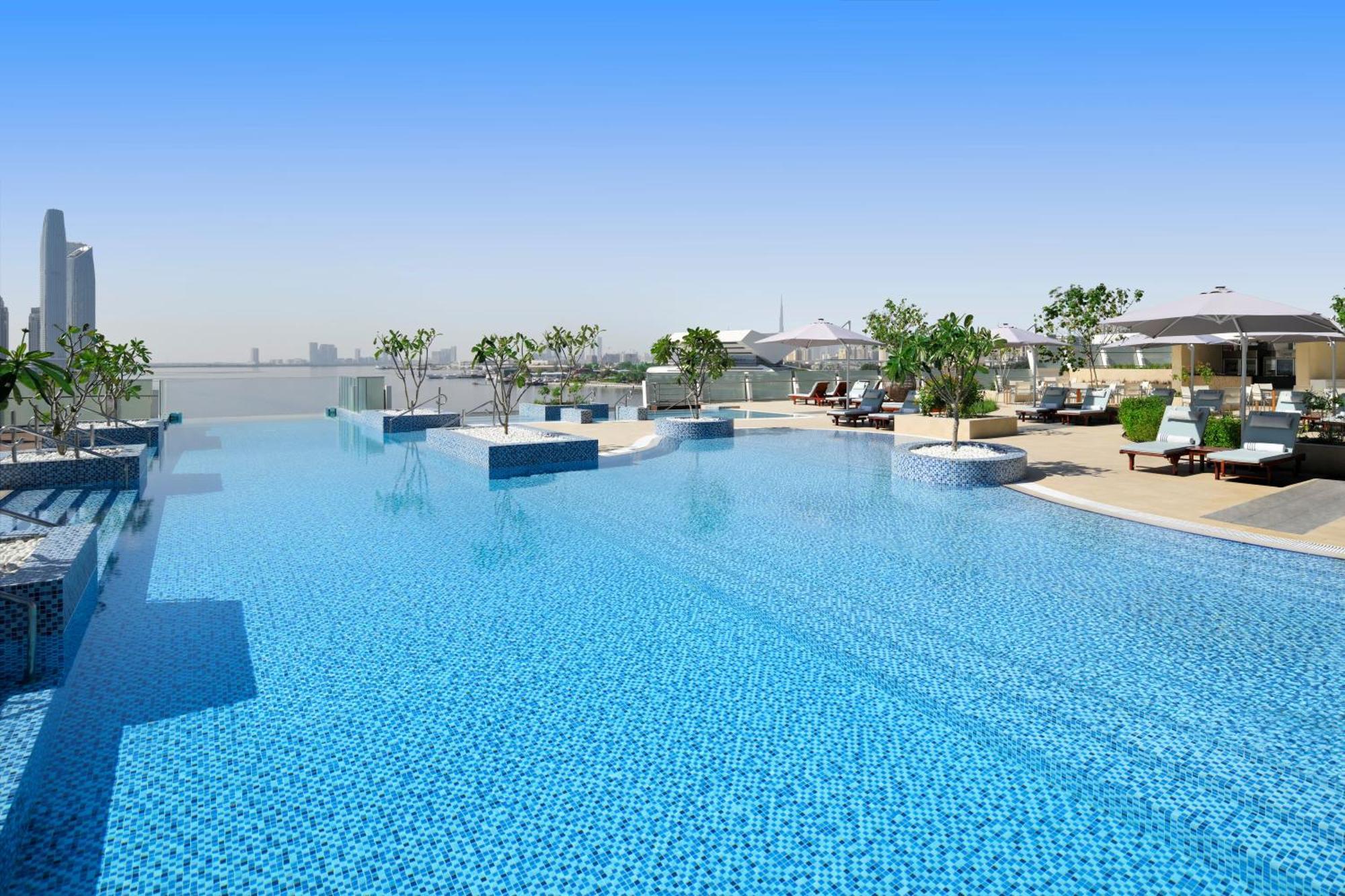 Intercontinental Dubai Festival City By Ihg Ngoại thất bức ảnh The swimming pool at the Address Downtown
